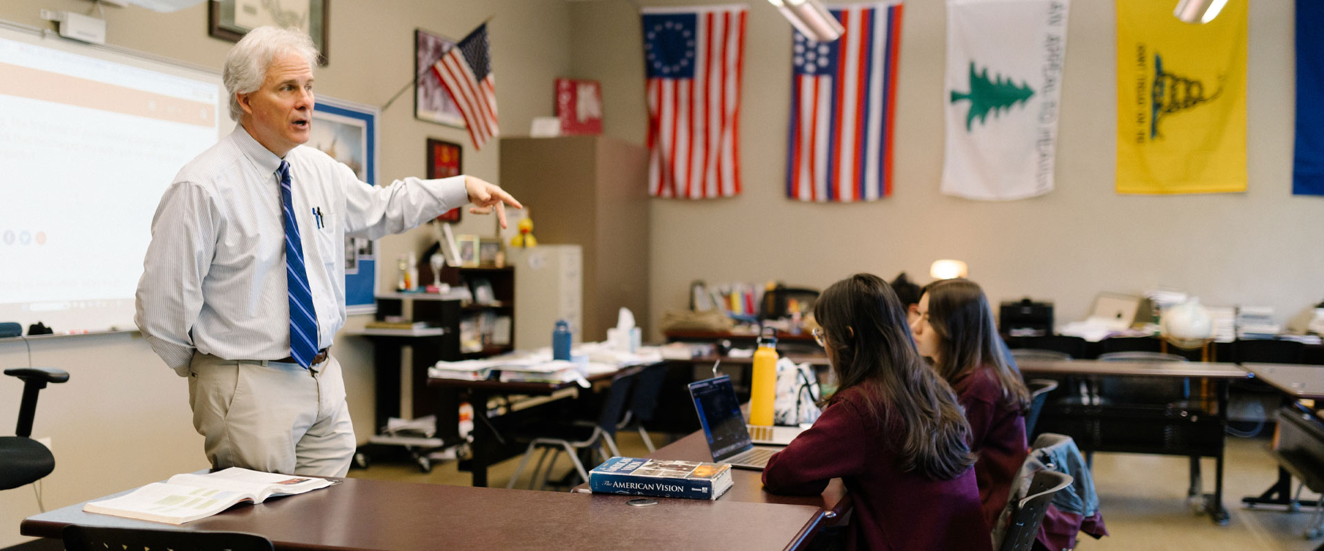 Best Boarding Schools in the US. Mr. James Griffin with students at St Bernard Prep School.